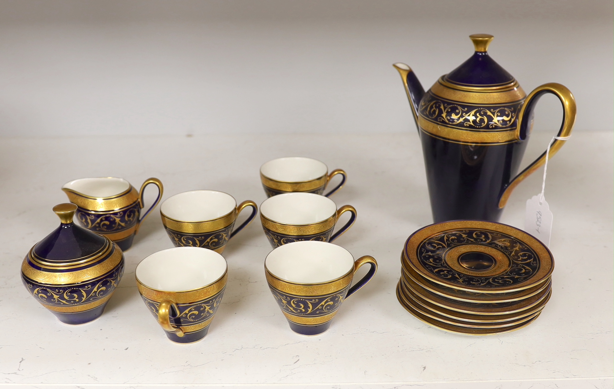 A Lindner cobalt and gilt part coffee set